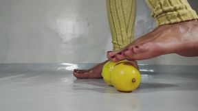 asian Filipina girl rose foot crushing lemons