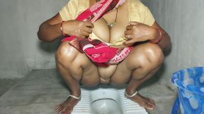 Aunty Pissing in Bathroom and I Caught and I See Her Big Pussy and Big Boobs