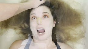Milana is bound and held by hair underwater