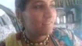 Skanky Indian mommy flashes her shaved pussy upskirt
