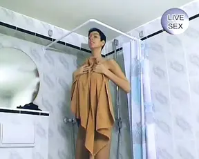 Attractive German slut plays with a dildo in the shower