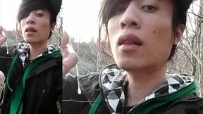 Outdoors, Jon Arteen masturbates his tumescent twink cock, ejaculates cum that sticks to his fingers and slowly drips.