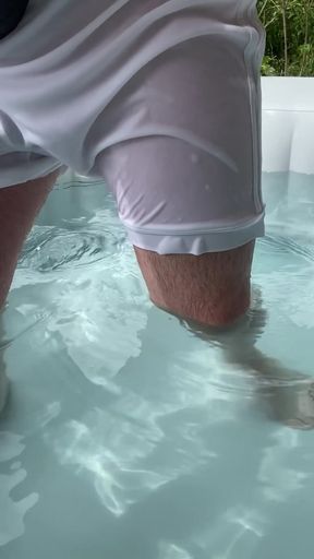 Pool cum in revealing shorts and t-shirt   Clip 1