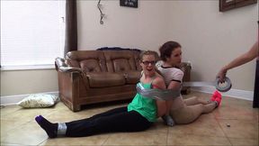 Two lesbians bound and gagged with dirty socks in a classic escape challenge