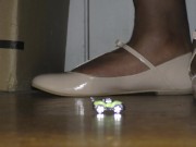 A Crossdresser in Flats - Dominating a Tiny Car in Nude Mary Jane Flats