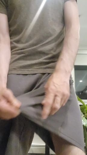 Man with commando thick cock shows off his big balls