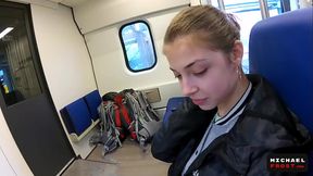 Petite brunette takes a public train ride