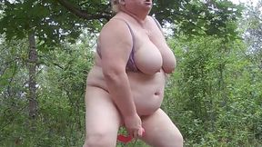 A Friend Undressed in a Park and Masturbates Her Pussy