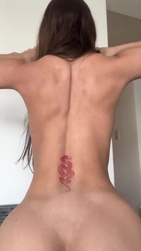 Fit woman with tattoo