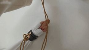 xy325-Petite cute Chinese girl is tied up with ropes in an iron ring on the wall