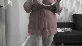 Mature BBW MILF tries on a nurse uniform.