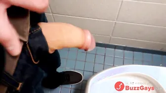 Uncut Twink Strokes His Big Cock in Public Restroom