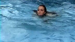 Meche Miley straitjacketed in pool
