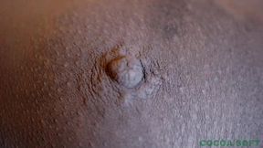 Close ups of the sexy Asian painted in black body