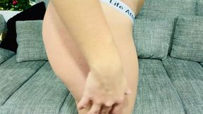 Sporty fit girl masturbating on the couch