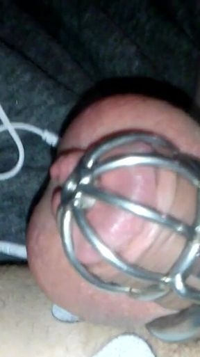 Pretty sissy Sadie caged e-stim orgasm