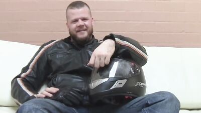 Buff biker takes his clothes off and masturbates with a toy