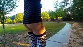 Crossdresser Walking in a public park in high heels
