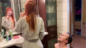 Redhead girl brushes her teeth and spits in slave's mouth - Amateur femdom humiliation