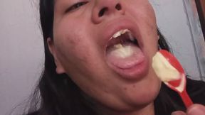 Licking ice cream From a spoon - Creamy Mouth