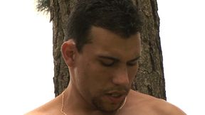 Beefy muscle dude masturbates outdoors