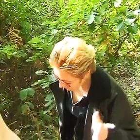 A mature German domina spanks her man in the woods