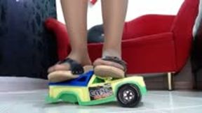 crushing the city cruiser toycar in wooden Berkemann sandals and sexy nylons