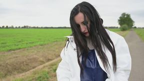 Amira in Farmerrain raingear walking around