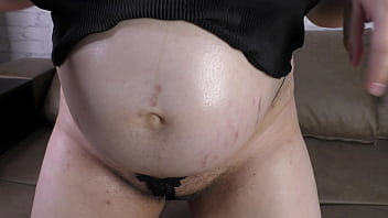 9 month pregnant MILF with a huge lactating boobs massaging her slutty body, boobs and very hairy pussy with an oil lotion - Milky Mari