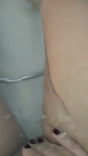 Algerian playing with her in a shower   Clip 1