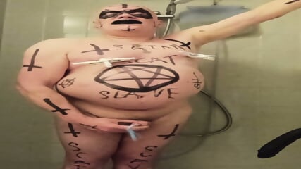 Satan slave takes a perverted piss enema
