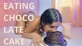 EATING CHOCOLATE CAKE