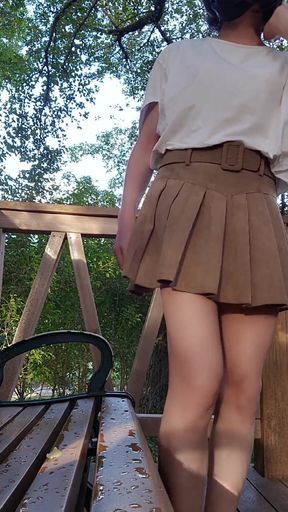 Shemale Ting Xuan Masturbates Outdoor and Ejaculates on Her Legs.