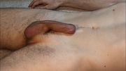 CoregasmicTruth can't help it and cums on his abs with his soft cock during workout