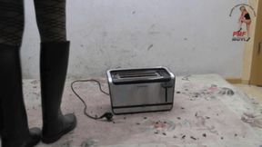 Toaster crushed under riding Boots