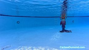 Carissa as a Mermaid in the pool at the resort