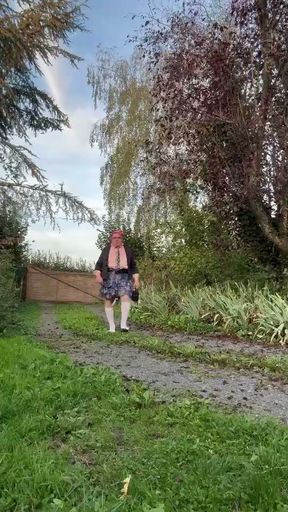 In a quick outfit with a floral skirt for an evening