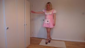 Nude stockings, white lingerie and pink costume