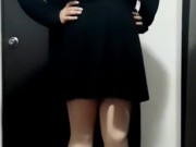 Cute crossdresser wearing dress and heels