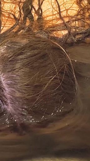 Captivating moment from &quot;Underwater Bathtub Blowjob With Long Haired Redhead MILF&quot;
