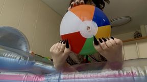 Evil lifeguard mass pops your beach balls with long nails and toe nails