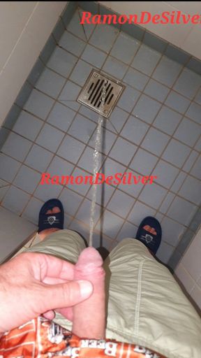 Master Ramon pisses in his hot satin shorts in the shower, slave lick it up!
