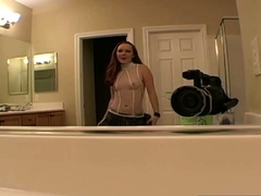 Solo redhead masturbates