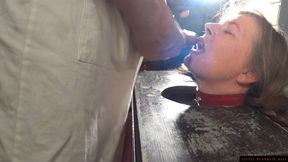 MILF Little Sunshine gets her face fucked in pillory by cock and a Bad Dragon