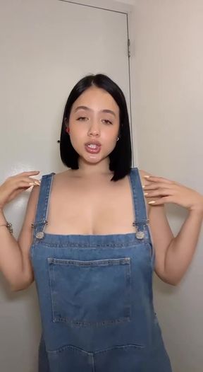 Woman in denim overalls
