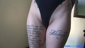 Two inked lezzies enjoying strapon dildo
