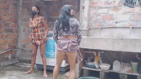 Gossipy neighbors talk dirty in the neighborhood yard. They have small buttocks.