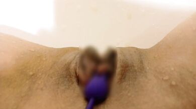 Her wet bath moans as the monster dildo fills her perfect pink hole