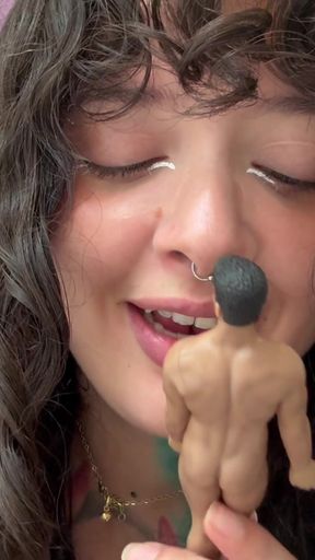 The Girl with a Big Butt Sits on Her New Sex Toy, a Tiny Shrunken Man