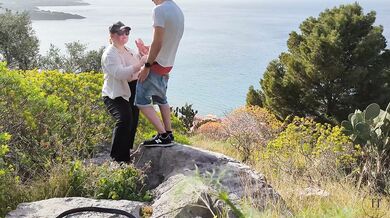 Spontaneous sex while hiking with a view over the city
